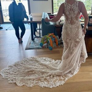 Elegant Allure Beaded Wedding Dress with Detailed Back and Train